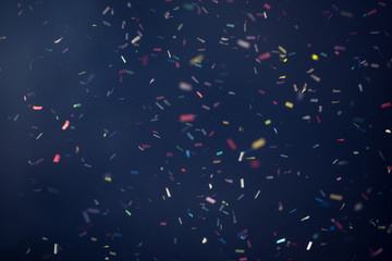 Confetti fired on air during a festival at night. Image ideal for backgrounds. Multicolor are the...