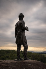 Sunset behind the Gouverneur Warren Statue at Little Round Top, Gettysburg, Pennsylvania