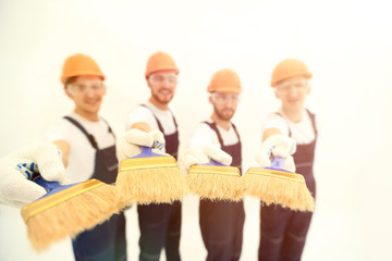 group of builders with different tools