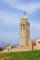 Fototapeta na wymiar View of ancient Saint Jovan Church in the Tivat village Bogisici, Montenegro