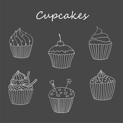 Vector cupcake illustration. Set of hand drawn cupcakes. Doodle cakes with cream and berries.