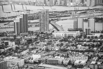 MIAMI - MAR 29, 2018: Aerial view of Miami skyline with buildings and MacArthur Causeway. Thr road connects the city with the beach