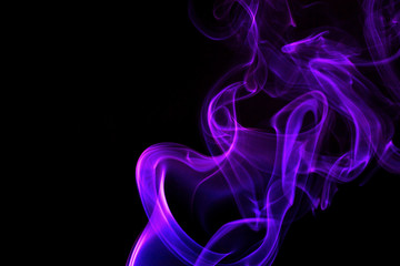 Purple smoke on black background