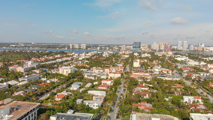 Fototapeta na wymiar Palm Beach buildings along the oceanfront, Florida aerial view