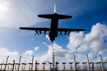 Old military container plane approach to airport runways use for air and cargo transport ,logistic industry