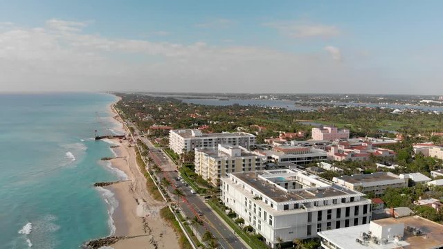 Pam Beach oceanfront buildings, aerial panoramic view on a beautiful day