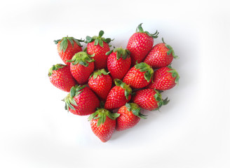 Freshness strawberries series - Heart shape of Strawberries with leaves. Isolated on a white background.
