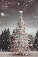 Fototapeta premium Composite image of christmas tree with falling snow