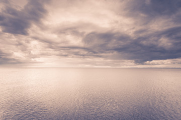 Fototapeta na wymiar Idyllic shot of horizontal sea water and sky