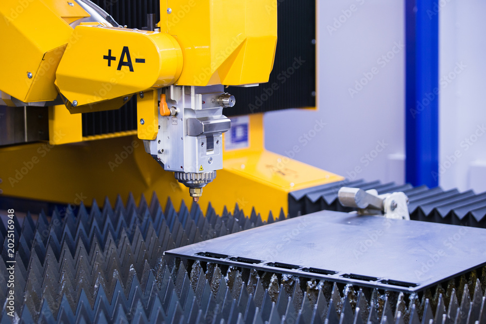 Aufkleber automatic machine with robotic arm for cutting metal. smart factory