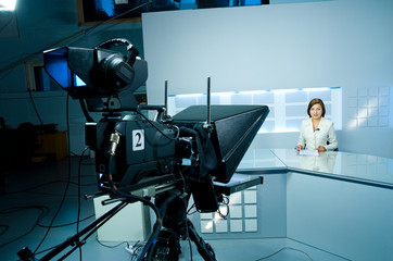 young anchorwoman at TV studio