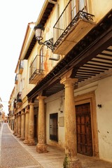 Fototapeta na wymiar Majestic and old stone houses through the streets of Alcaraz, Castile-la Mancha community, Spain