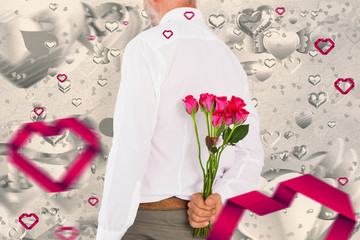 Man holding bouquet of roses behind back against grey valentines heart pattern