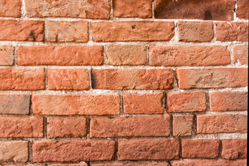 old brick masonry made of red brick. part of a brick wall. architecture. structure.