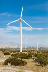Fototapeta na wymiar Dramatic Wind Turbine Farm in the Desert of California.