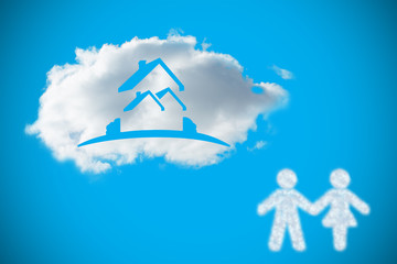 Cloud in shape of couple against blue background with vignette