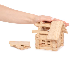 Wooden house constructor hands
