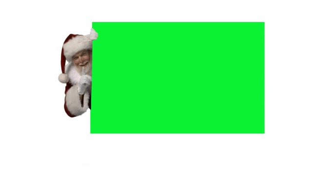Santa coming out from behind a green screen for your logo/text and motioning to be quiet