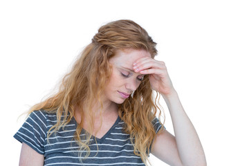 A blonde woman having headache