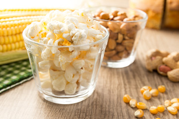 Popcorn. Food of Festa Junina, a typical brazilian party. Snack on wood table.