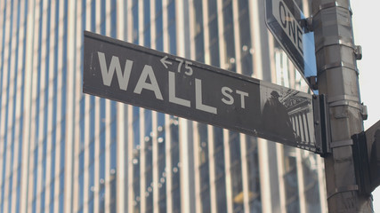 CLOSE UP: Famous Wall Street sign in Lower Manhattan New York financial district