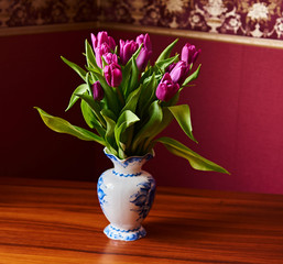 Lilac Tulips. Bud, petals, bouquet/Lilac tulips in a decorative vase stand on a table. Russia, Moscow, holiday, gift, mood, nature, flower, plant, bouquet, macro