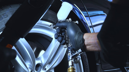 Professional coating of ceramic wheels and rubber, spray gun for painting, car service, shop,...