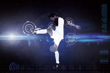 Football player against blue dots on black background