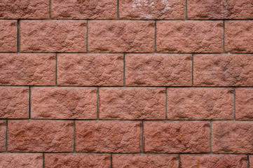 Naklejka premium Macrophotography close up background texture of rectangular red wall bricks