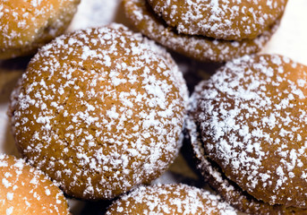 Fresh baked homemade shortbread cookies with powdered sugar