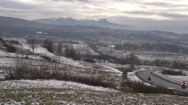 Pan of road and hills