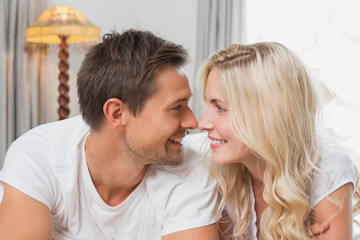 Relaxed happy casual couple at home