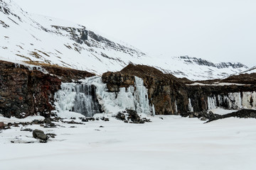 partially frozen waterfall