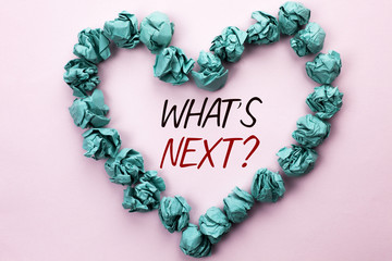 Obraz premium Conceptual hand writing showing What s Next Question. Business photo text Asking Imagination Choice Solution Next Questionaire written on Plain background within Heart Paper Balls.