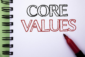 Handwriting text Core Values. Concept meaning Principles Ethics Conceptual Accountability Code Components written on Notebook Book on the plain background Marker next to it.