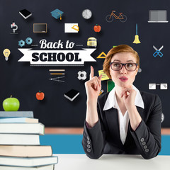 Thinking redhead teacher against red apple on pile of books in classroom