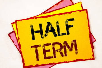 Conceptual hand writing showing Half Term. Business photo showcasing Short holiday in the middle of the periods school year is divided. Concept For Information