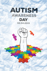 Autism awareness day against crumpled white page 