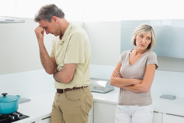 Fototapeta premium Angry couple after a fight in kitchen