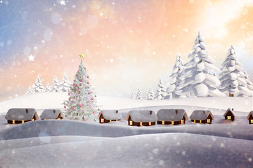 Snow covered village against snowy landscape with fir trees