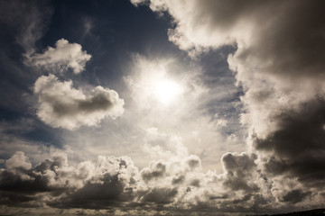 Dark sky with white clouds