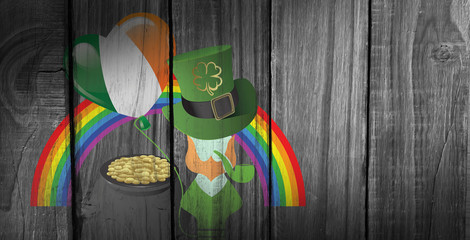 St patricks day graphics against overhead of wooden planks