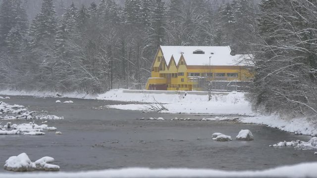 Traun River flowing during snowfall