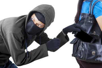 Thief steals phone of young woman on studio