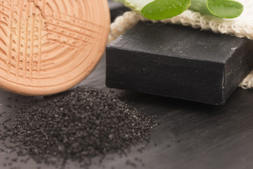 block of natural carbon soap with aloe vera