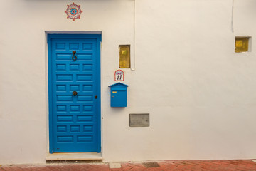Beautiful entries, doors and windows of Frigiliana, village of Malaga