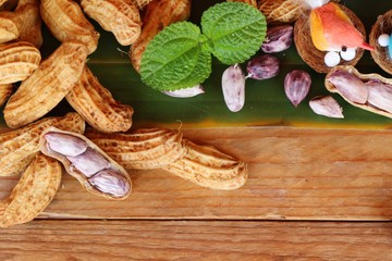 Boiled peanuts is delicious on wood background
