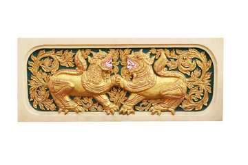 Young twin lion ,traditional thai stucco pattern with carving in  templeisolated on white background  ,Chiang Mai,Thailand