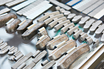 Fototapeta premium Balancing weights for car wheels