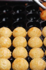 Takoyaki is delicious Japanese food on pan